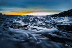 Flowing Ice - Ice and sea waved dancing together in Iceland